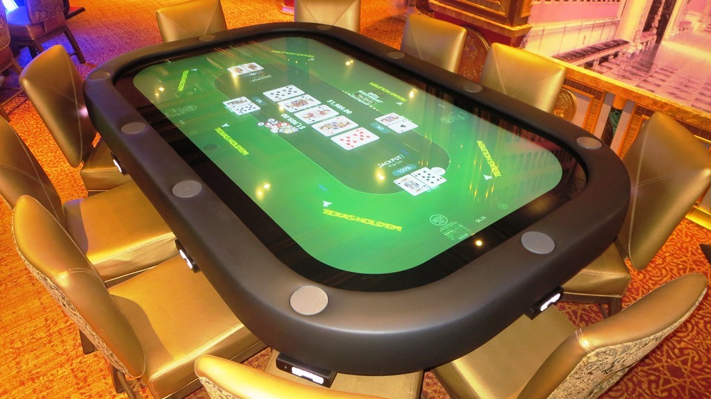 a jackpot blitz electronic poker table on a cruise ship